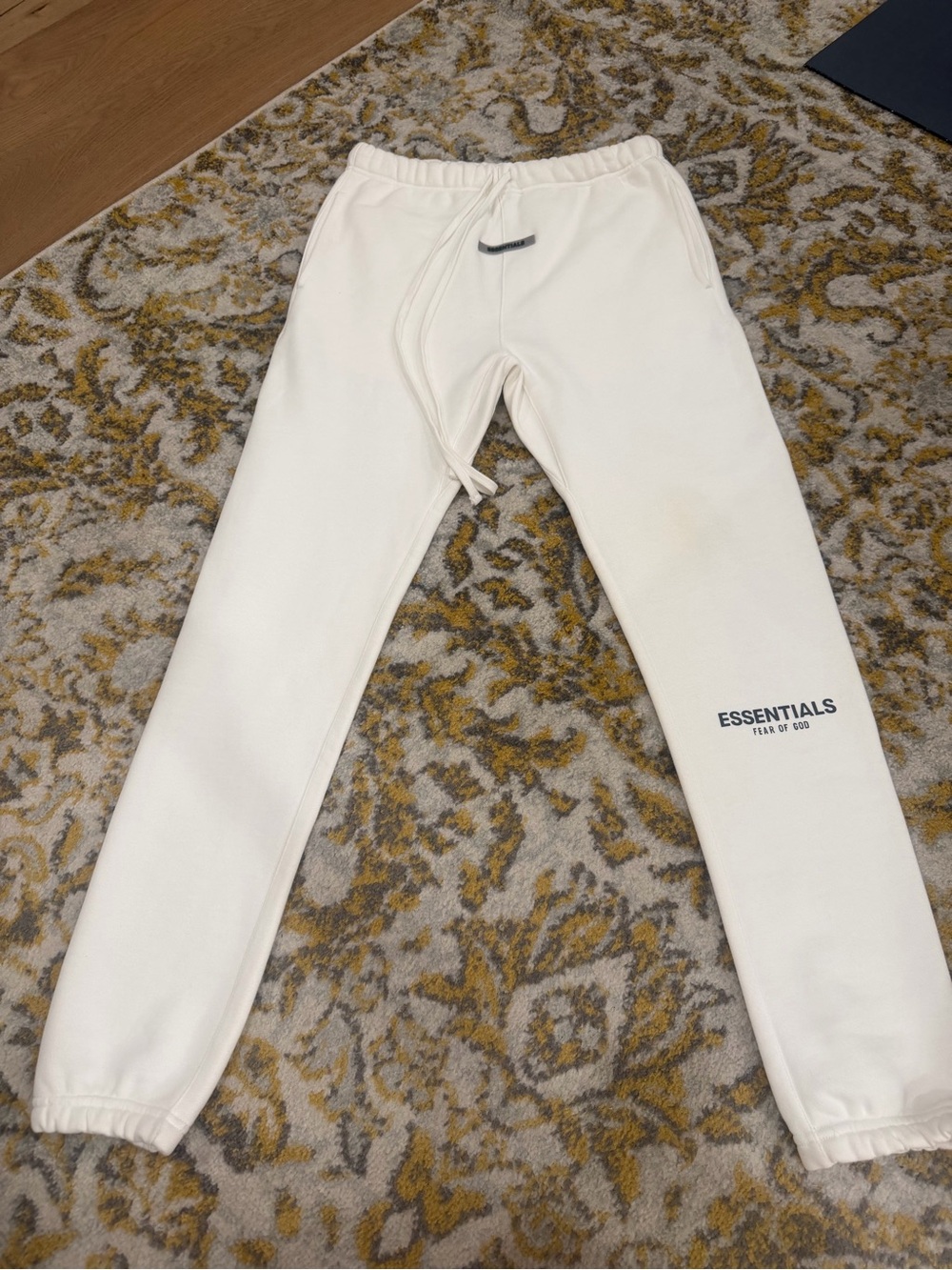 Fear of God ESSENTIALS Off-White Sweatpants with Navy Logo